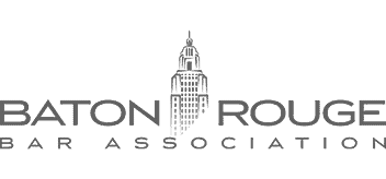 Logo for the Baton Rouge Bar Association featuring a line drawing of the Louisiana State Capitol, representing a local injury law firm.